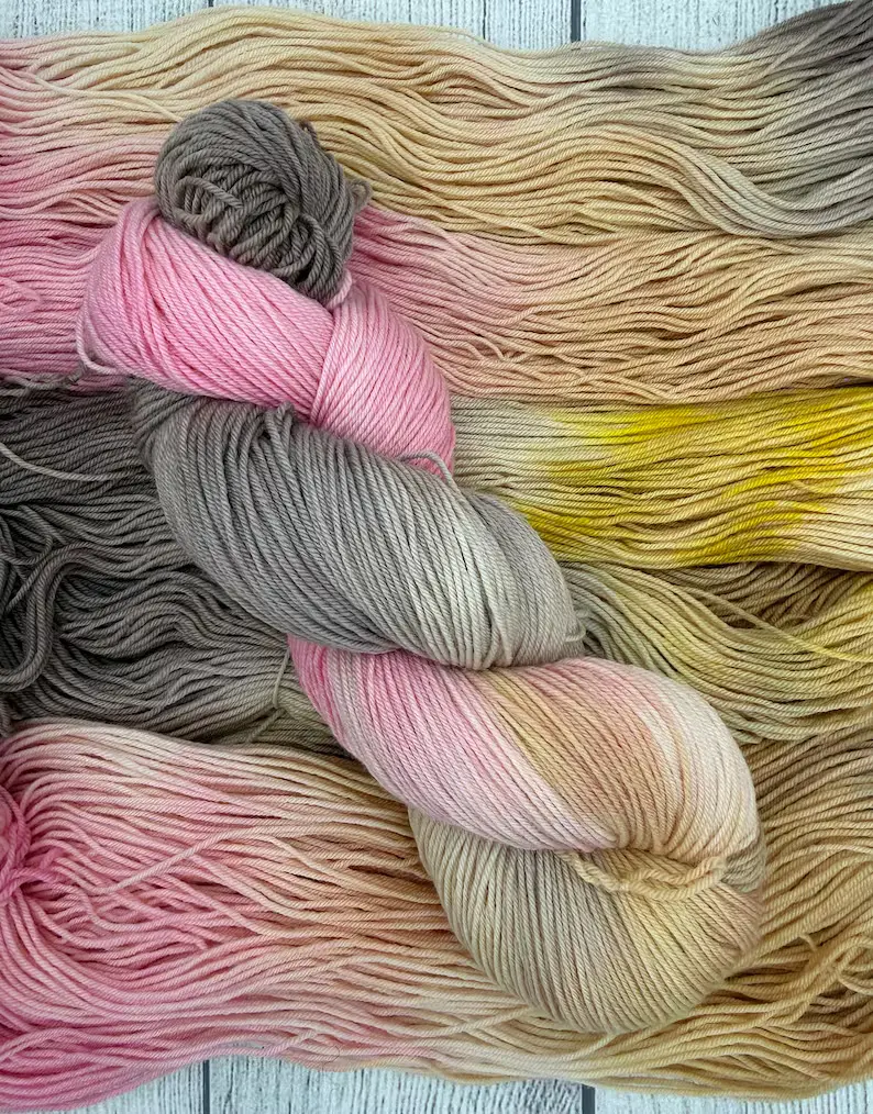 Delulu hand dyed yarn by AJem Fiber Arts